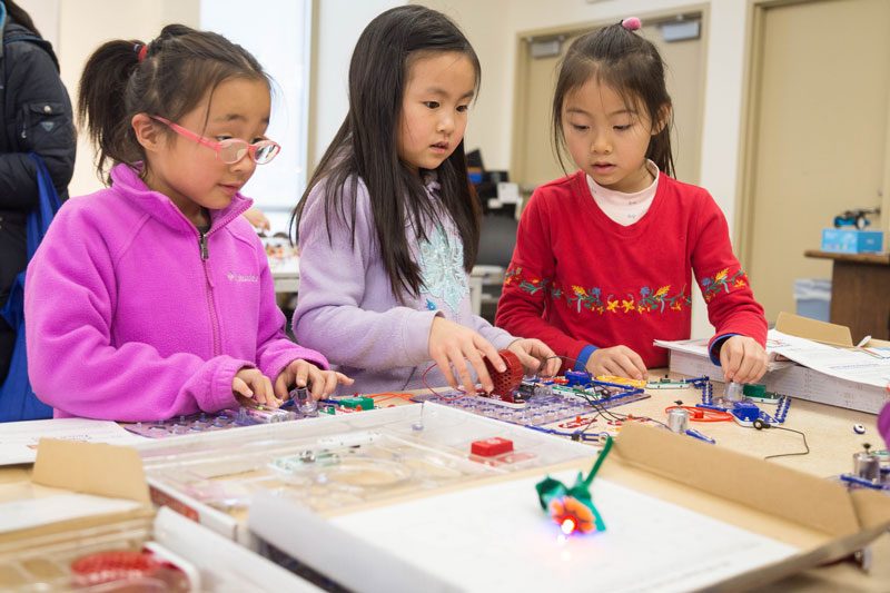 kids interact with stem kits