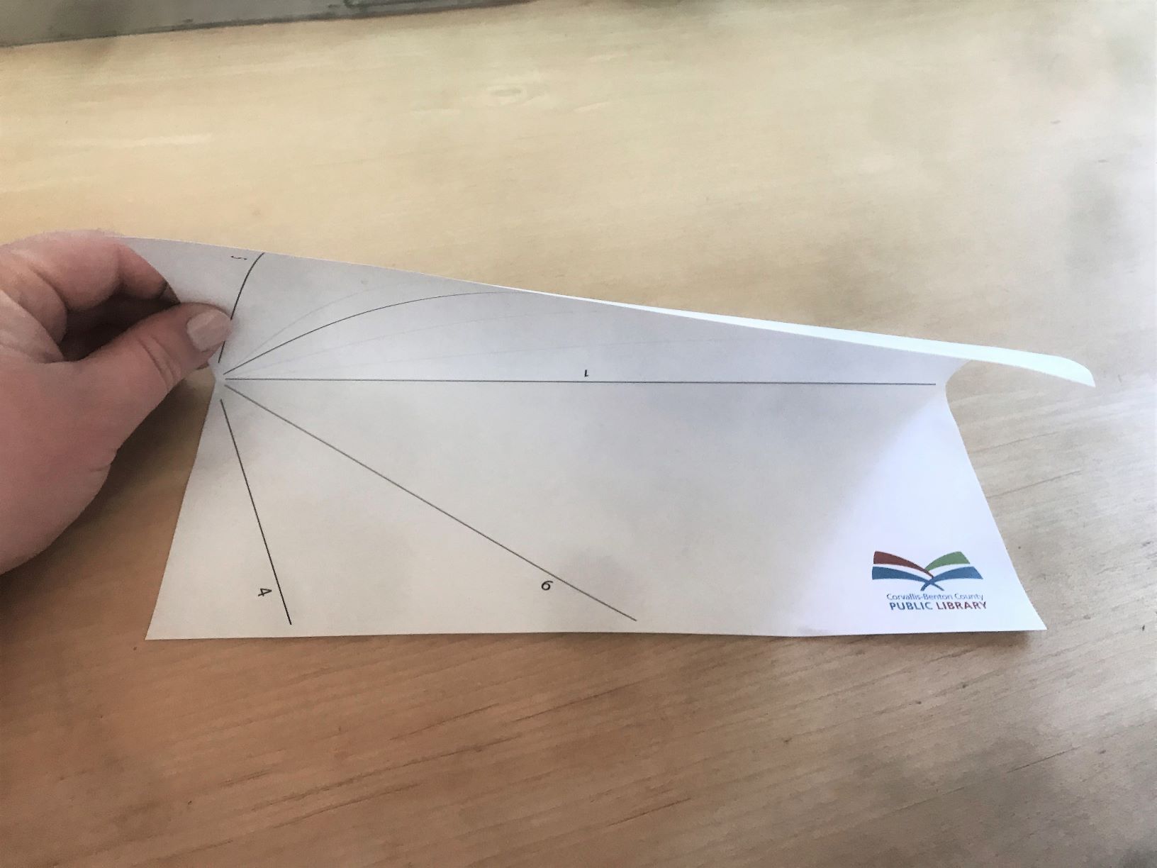 Photo of paper airplane step 1